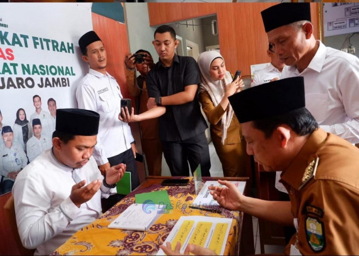 Bupati Muaro Jambi Bayar Zakat Fitrah di BAZNAS, Instruksikan ASN dan PPPK Ikut Menyalurkan