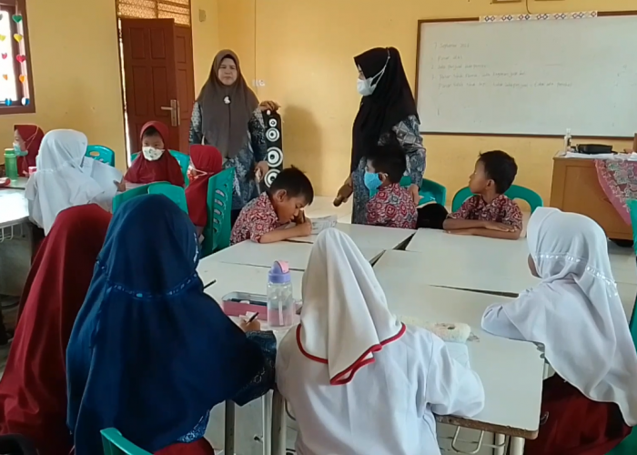 Kabupaten Tebo Diselimuti Asap, KBM di SDN 147 Tetap Berjalan Seperti Biasa