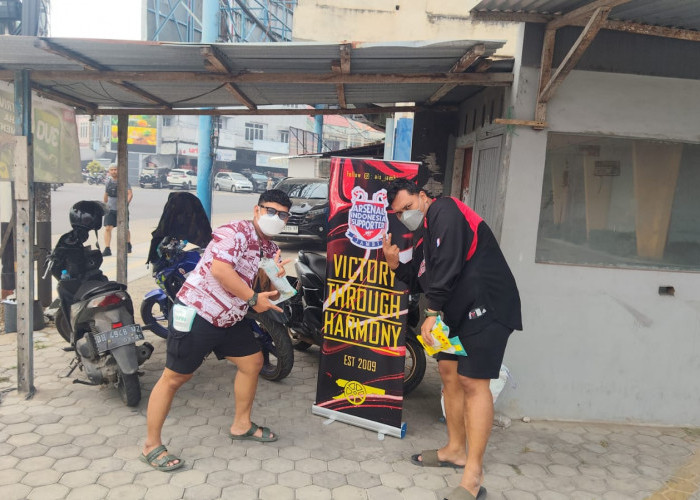 Peduli Kabut Asap, Arsenal Indonesia Regional Jambi Bagikan 1.000 Masker kepada Warga