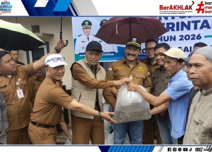 Wawako Azhar Hamzah Hadiri Penyaluran Bantuan Benih Ikan di Sungai Penuh
