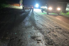 Jalan Nasional Dipenuhi Lumpur, Pengendara Terancam Celaka Di Parit Culum II